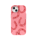 Coque iPhone 15 rose bonbon motif fer à cheval porte-bonheur