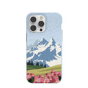 Coque pour iPhone 14 Pro Max : Montagnes et fleurs bleu poudre